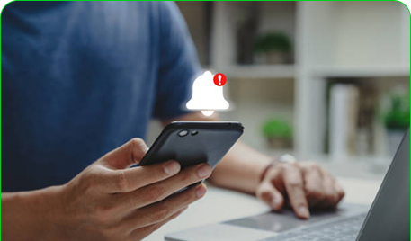 Person receiving alerts on phone